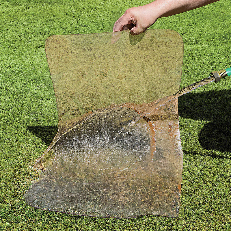 Using a hose to clean a Protect-A-Mat vinyl floor mat