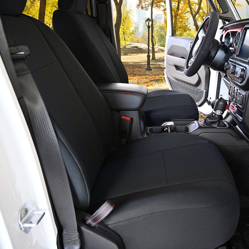 Seat Décor Kingston black seat covers and a view of trees outside.
