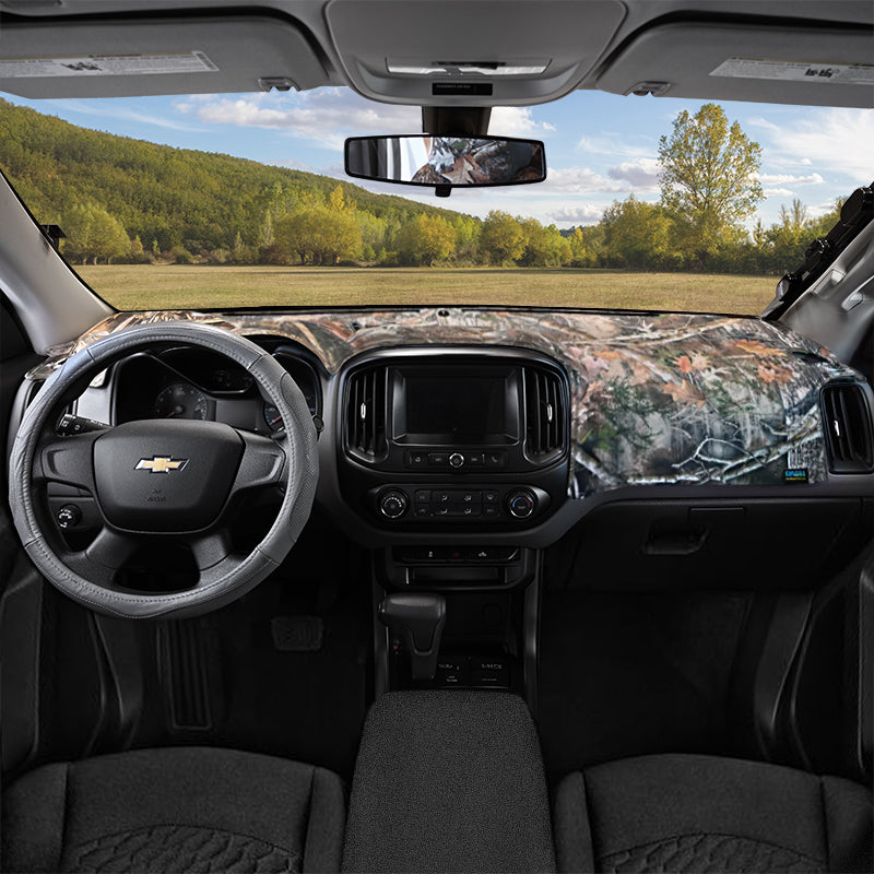 TrueTimber Kanati dash cover with a field in the background