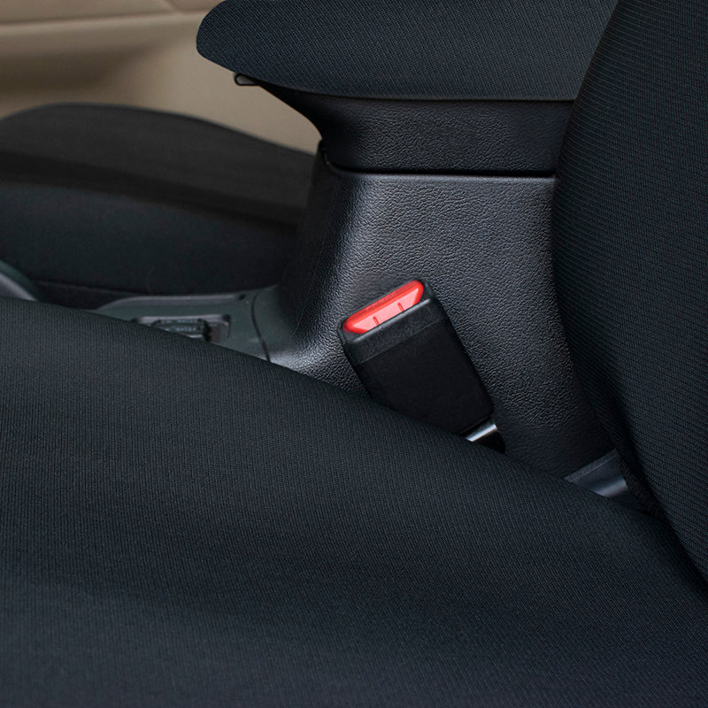 Close-up of Kingston Black car seat cover with a visible seat belt buckle.