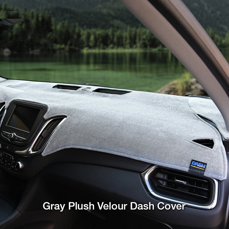 Plush Velour Gray dash cover with a lake in background