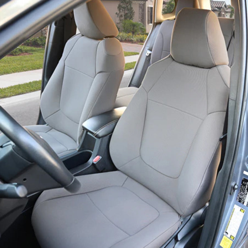Car interior with gray leatherette seats.
