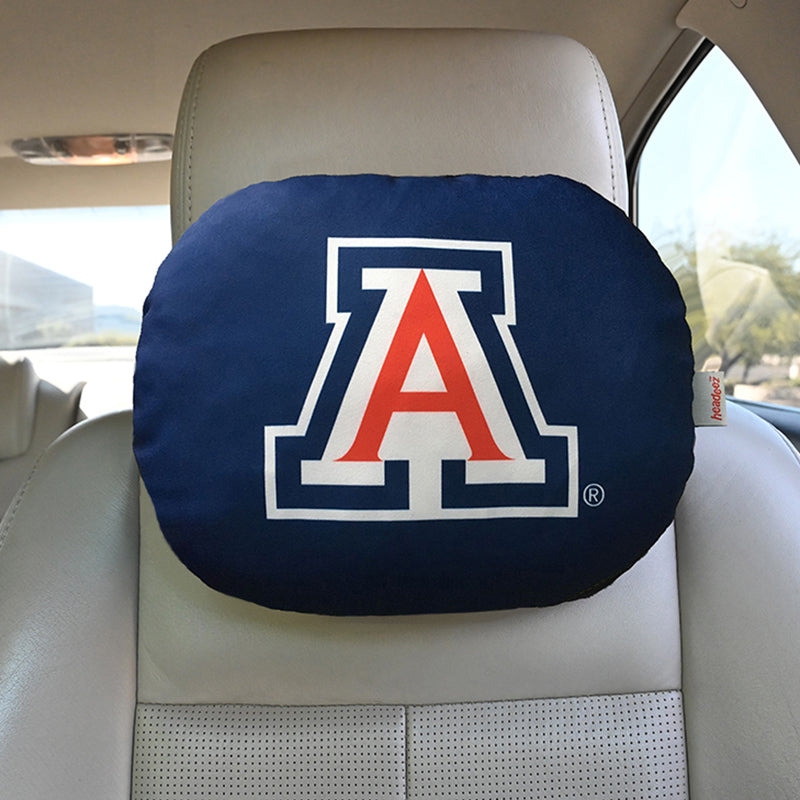 U of A Travel Pillow on gray seat
