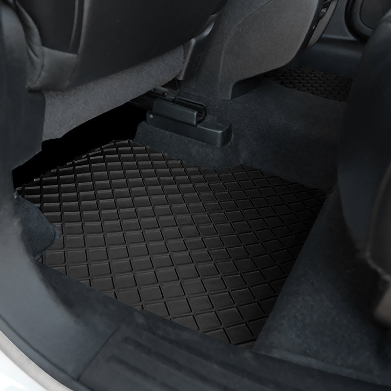 Black FlexoMat rear floor mat in a vehicle interior