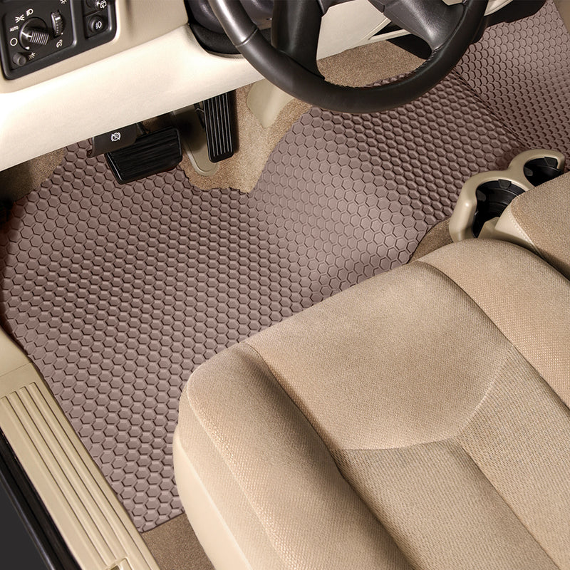 Car interior with Tan HexoMat 1-piece runner and beige seat