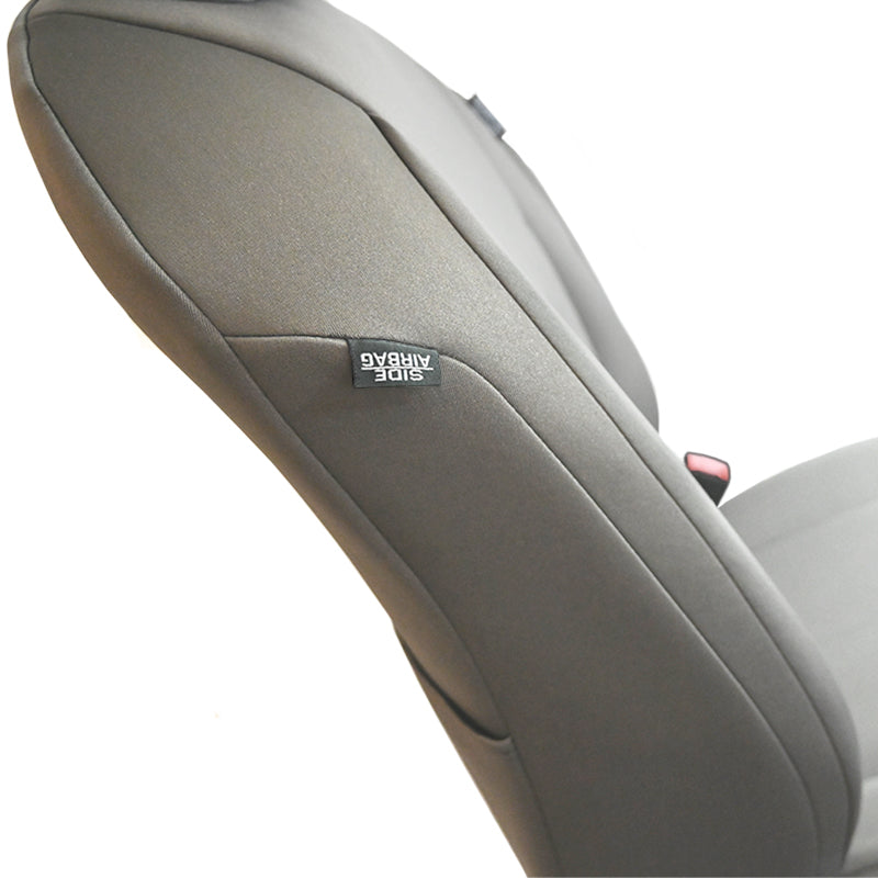 Seat Décor Closeup of Genuine Neoprene seat cover with airbag label