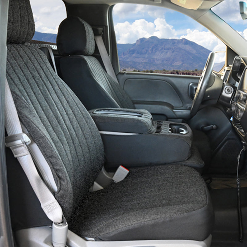 Duramax Tweed Charcoal seat covers in truck with mountains in background