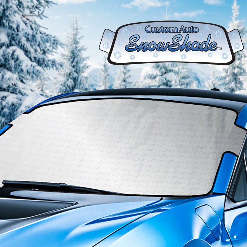 Car with a snowshade in a snowy landscape
